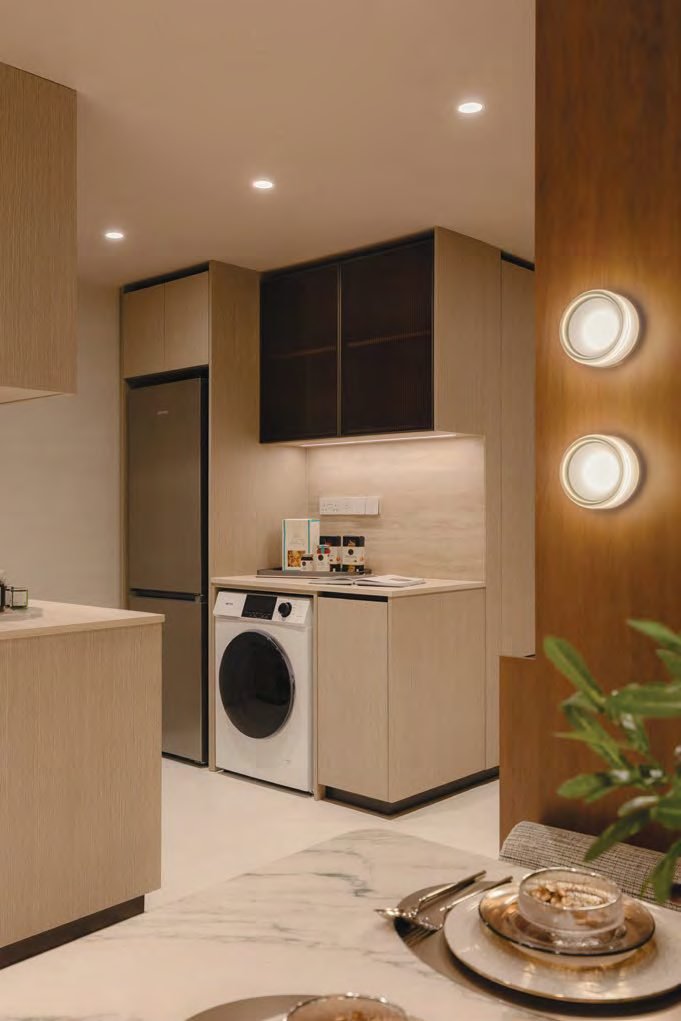 Thomson Reserve 2-bedroom premium plus study show unit — kitchen and utility layout with washer, dryer and built-in cabinetry
